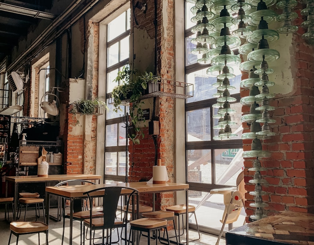 A bright café interior with tables and armchairs
