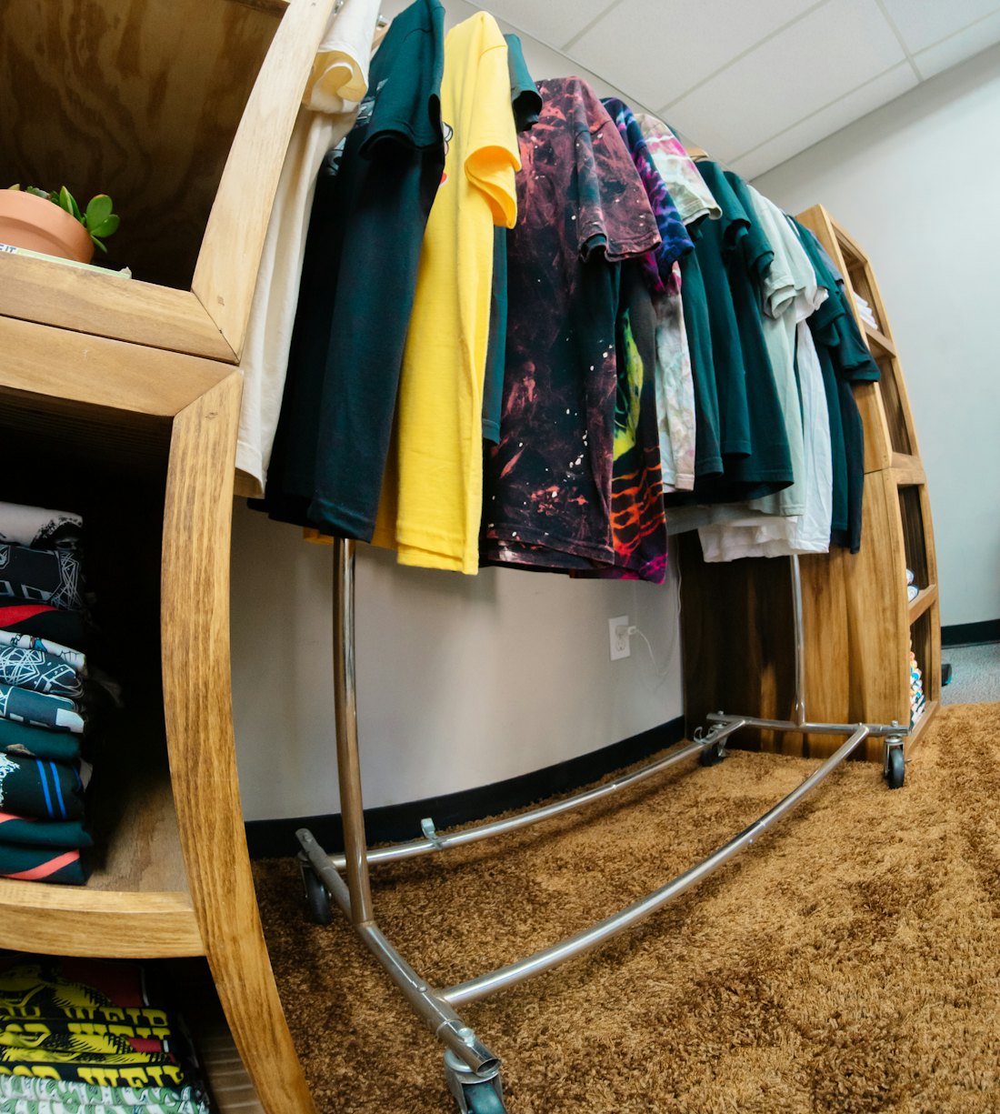 Folded stock and rails in a clothing shop
