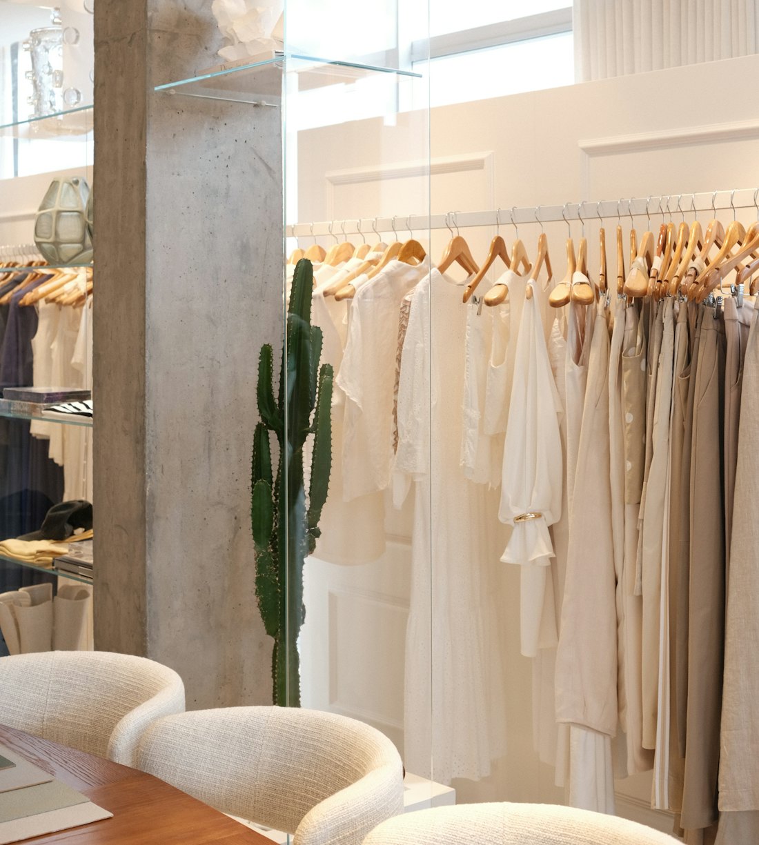 A rail of clothing in a boutique