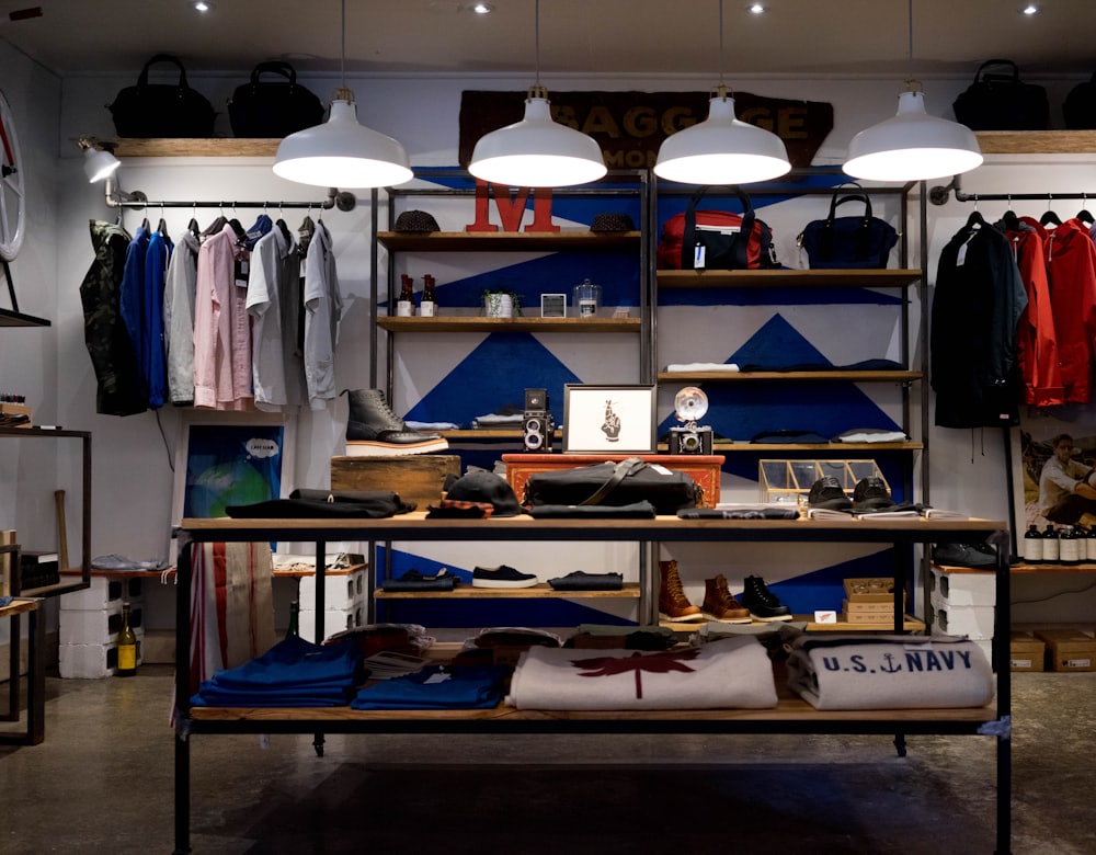 Folded garments stacked on shop shelves